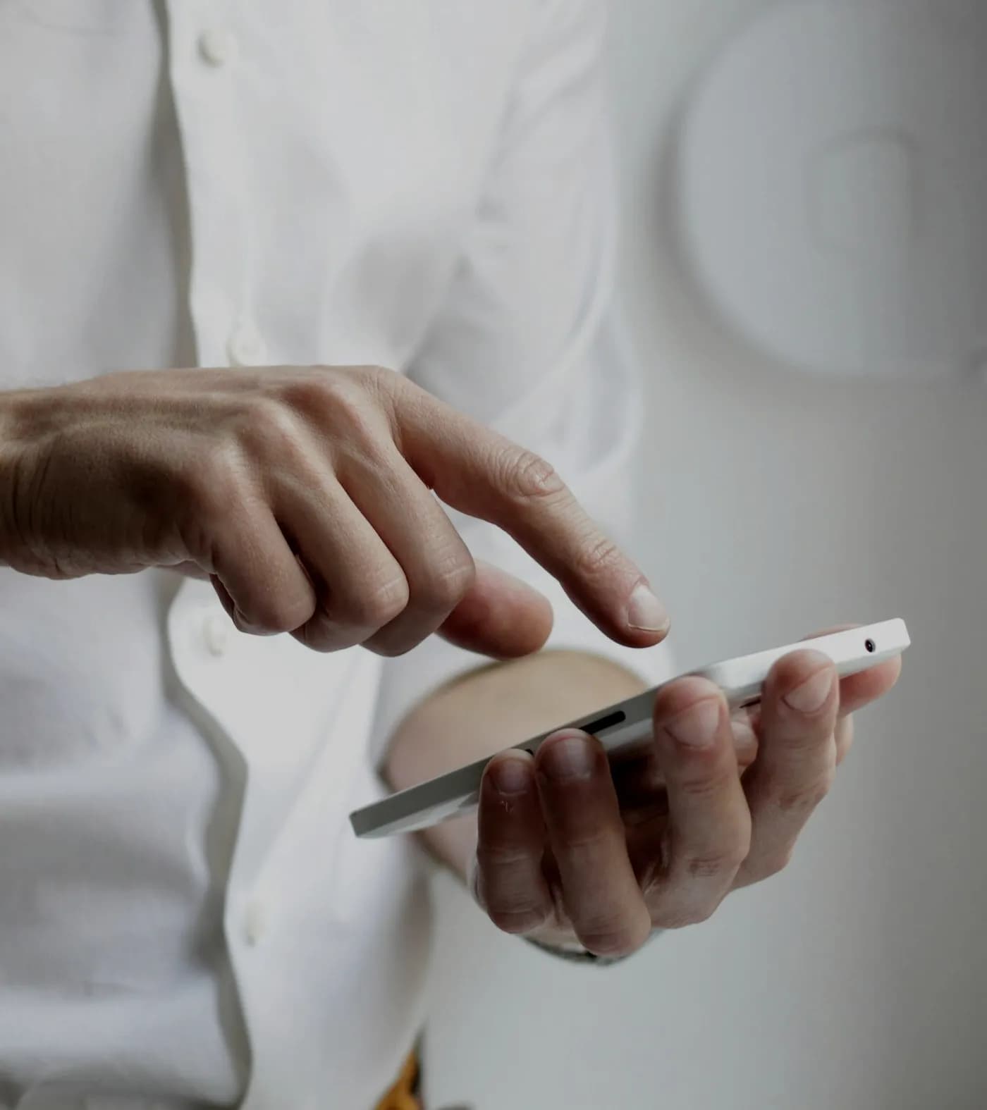 Hands using an app on a phone